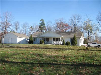 471 Youngs Chapel Road Corbin, KY 40701 - Photo 1 of 20 front view of home with large garage, po