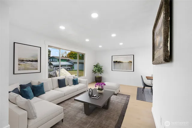 a living room with furniture and a table