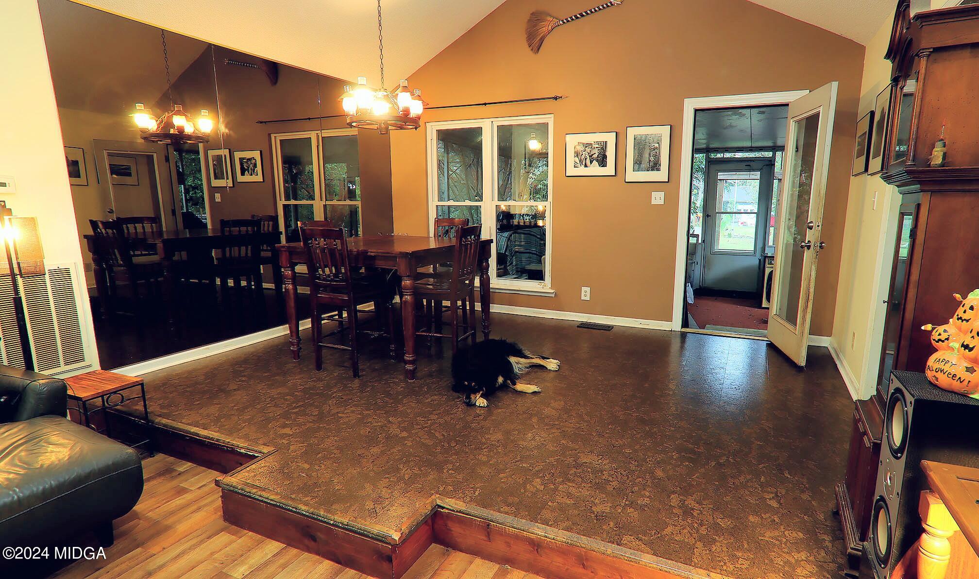 116 Coley Lake Road Macon, GA 31216 - Photo 9 of 22 a dining room with furniture and wooden floor