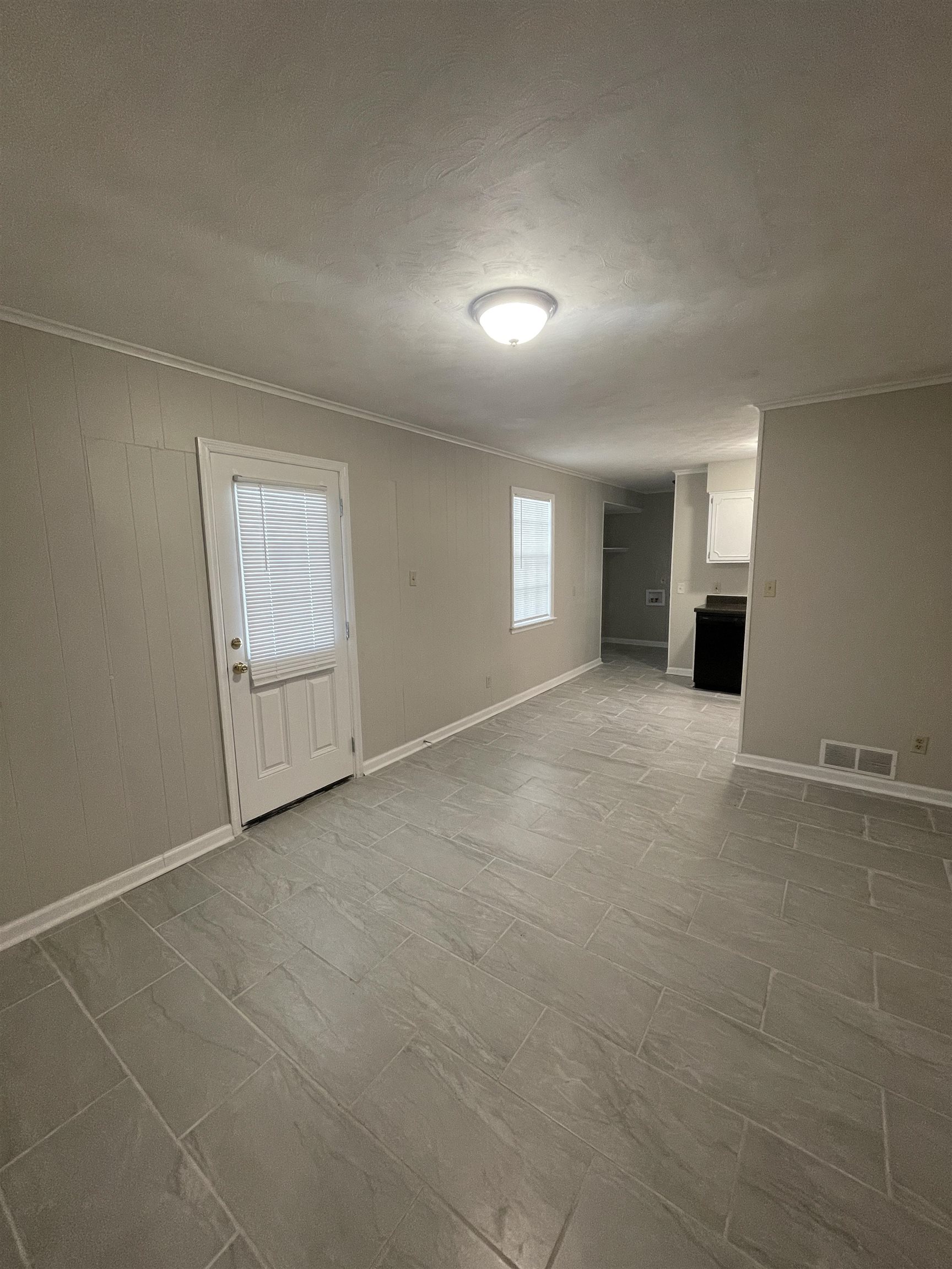 2987 Ruskin Road Bartlett, TN 38134 - Photo 4 of 12 an empty room with windows