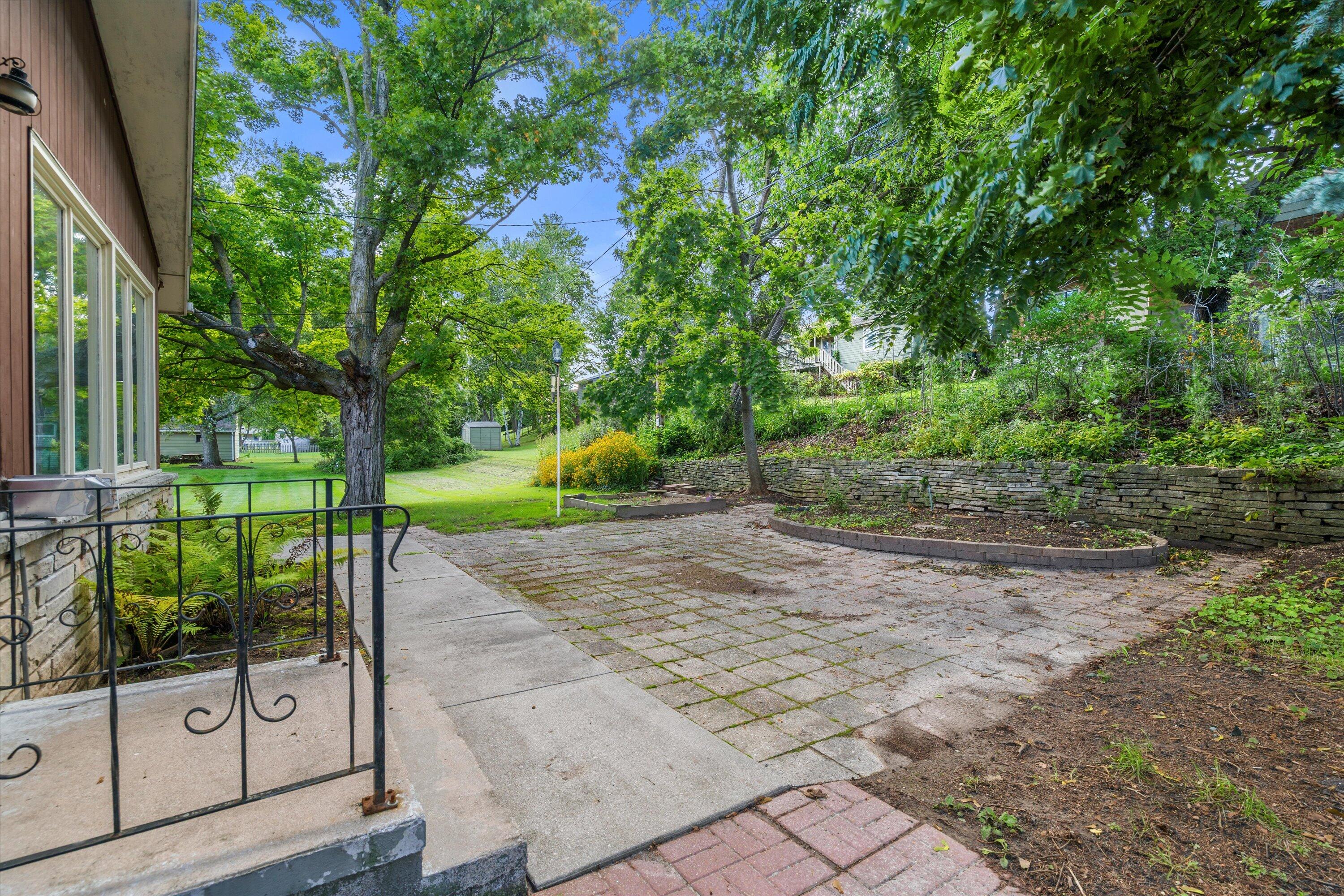 607 West Decorah Road West Bend, WI 53095 - Photo 2 of 36 Back porch & patio