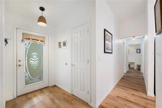a living room with furniture rug and window