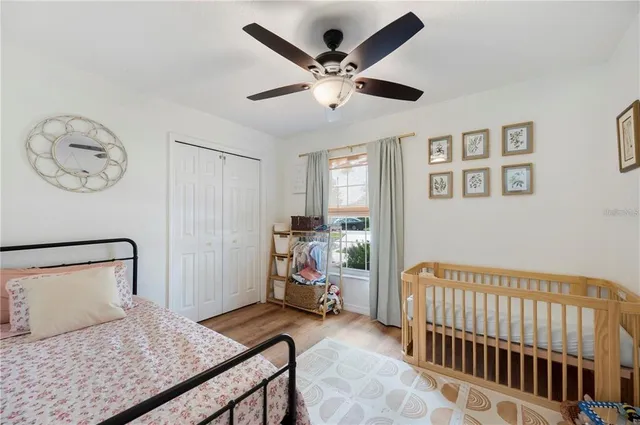 a view of an empty room with a floor to ceiling window and an outdoor view