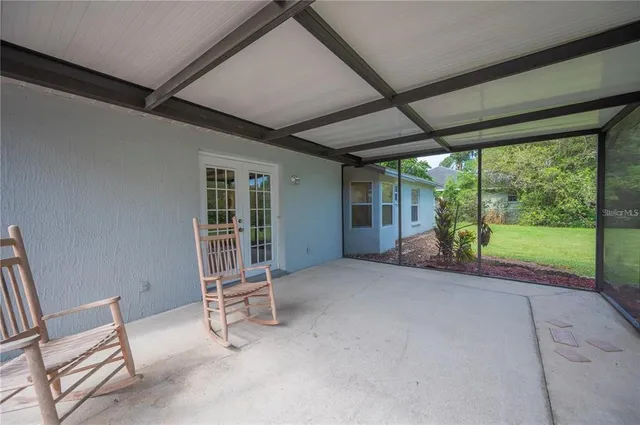 a view of a pathway with a dinning space