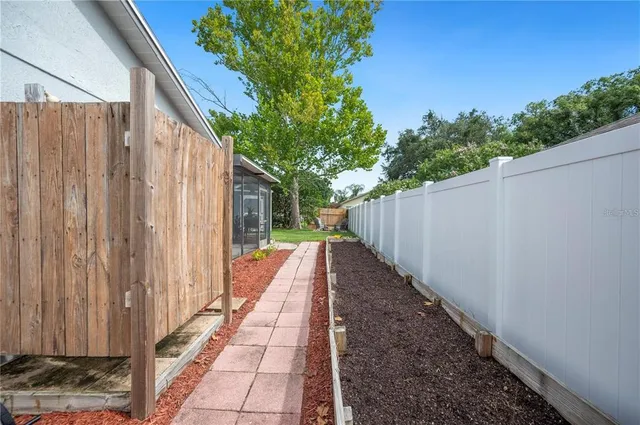 a view of a backyard with a garden