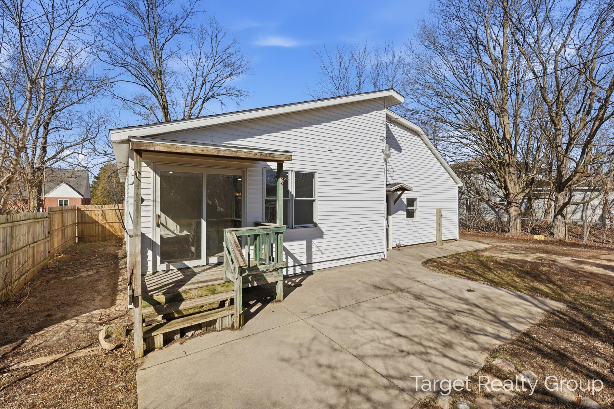 46 Hoskins Street Hesperia, MI 49421 - Photo 32 of 39 Back Patio/Covered Porch