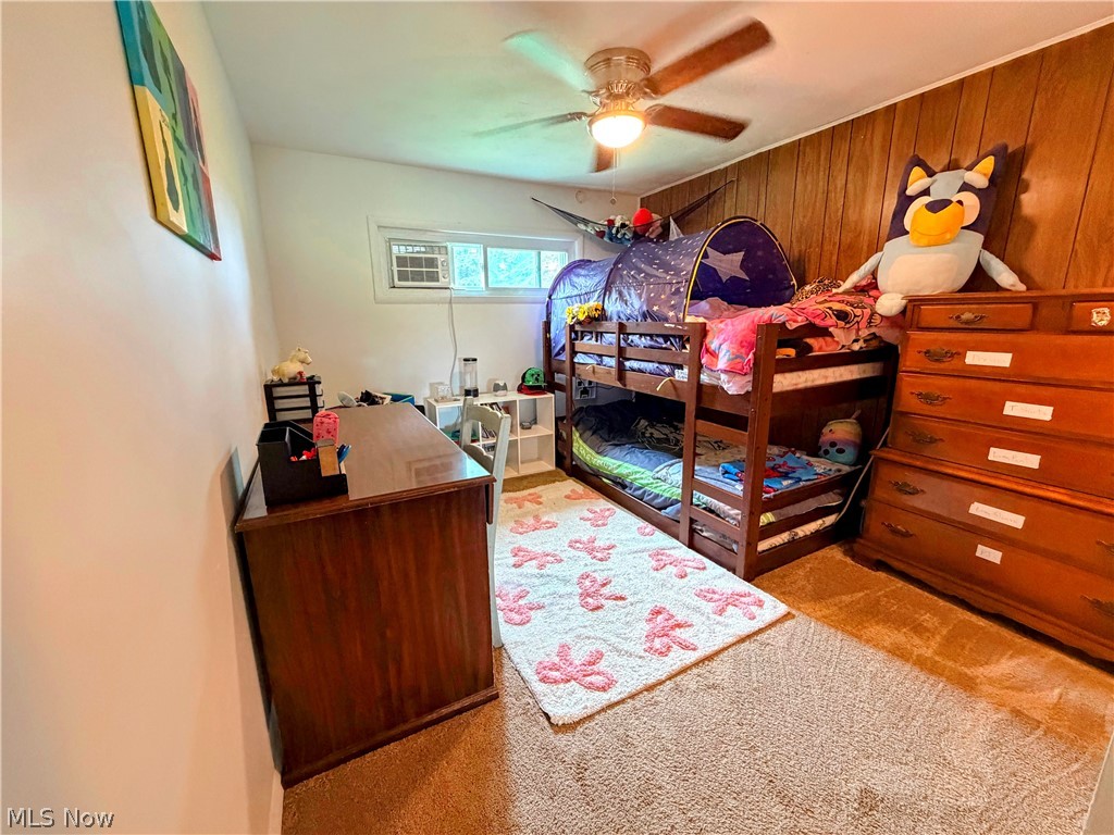 728 Johnson Plank Road Warren, OH 44481 - Photo 15 of 24 3rd bedroom with window unit and ceiling fan