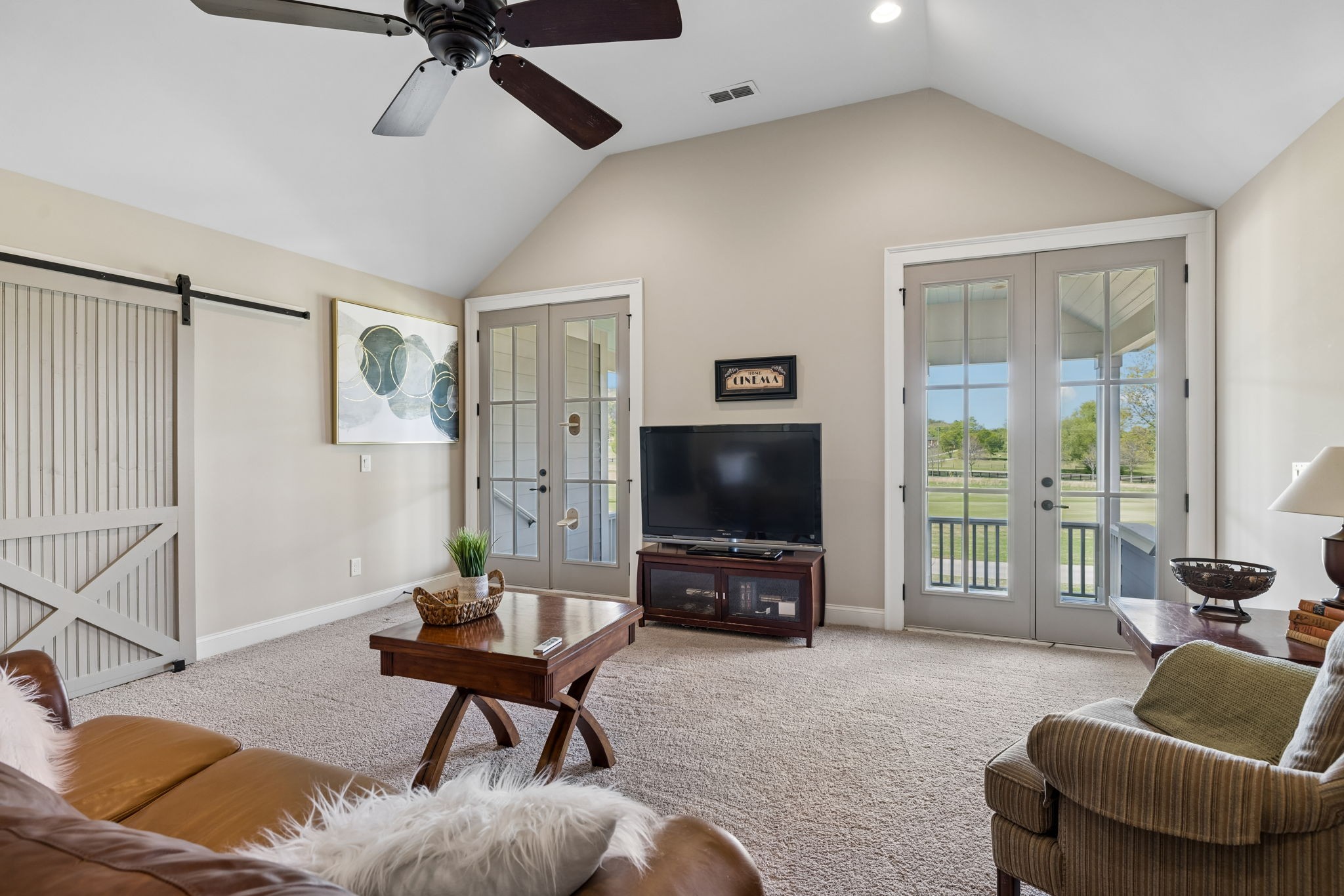 6033 Native Pony Trail College Grove, TN 37046 - Photo 58 of 87 a living room with furniture and a flat screen tv