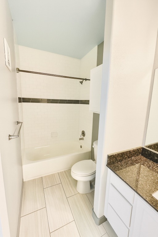 200 Maple Lane, Unit 1201 Elgin, TX 78621 - Photo 14 of 23 a bathroom with a granite countertop sink toilet and shower