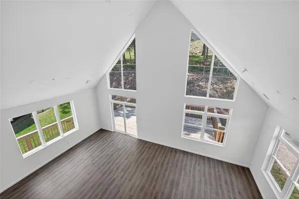 an empty room with windows