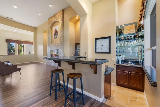 a large bathroom with a large tub and sink