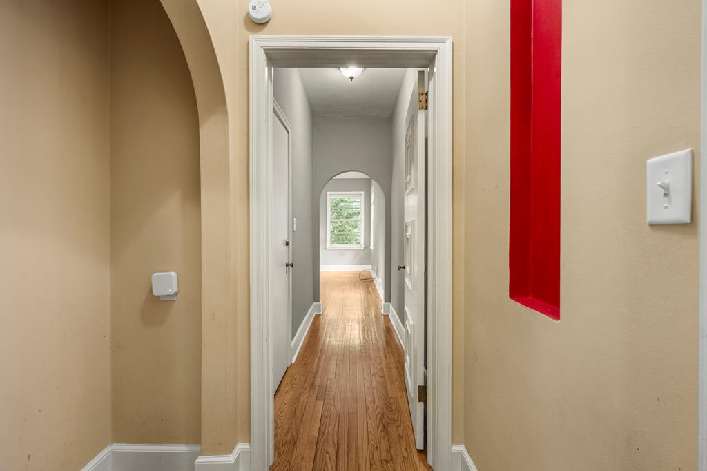 1500 Preston Drive Columbus, GA 31906 - Photo 12 of 29 a view of a hallway with wooden floor and a bathroom