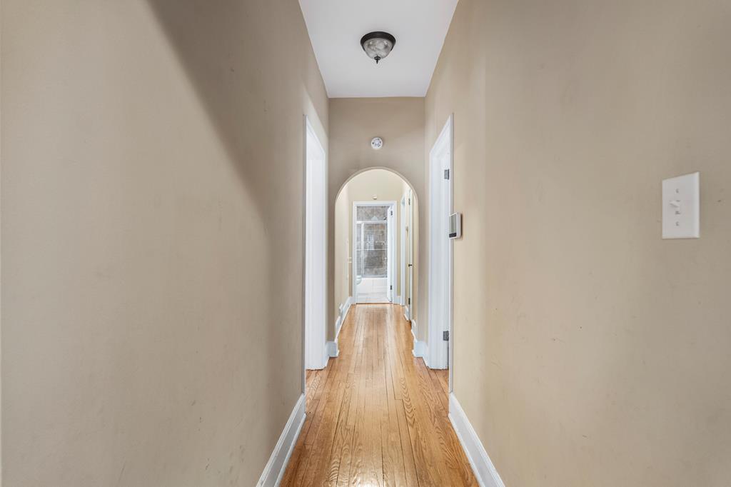 1500 Preston Drive Columbus, GA 31906 - Photo 13 of 29 a view of a hallway with wooden floor and a bathroom