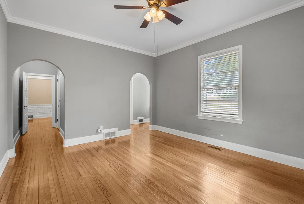 1500 Preston Drive Columbus, GA 31906 - Photo 17 of 29 a view of a room with wooden floor and chandelier