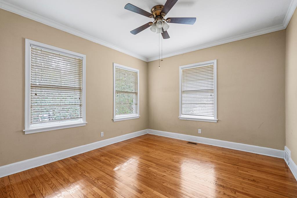 1500 Preston Drive Columbus, GA 31906 - Photo 25 of 29 a view of an empty room with wooden floor and a window