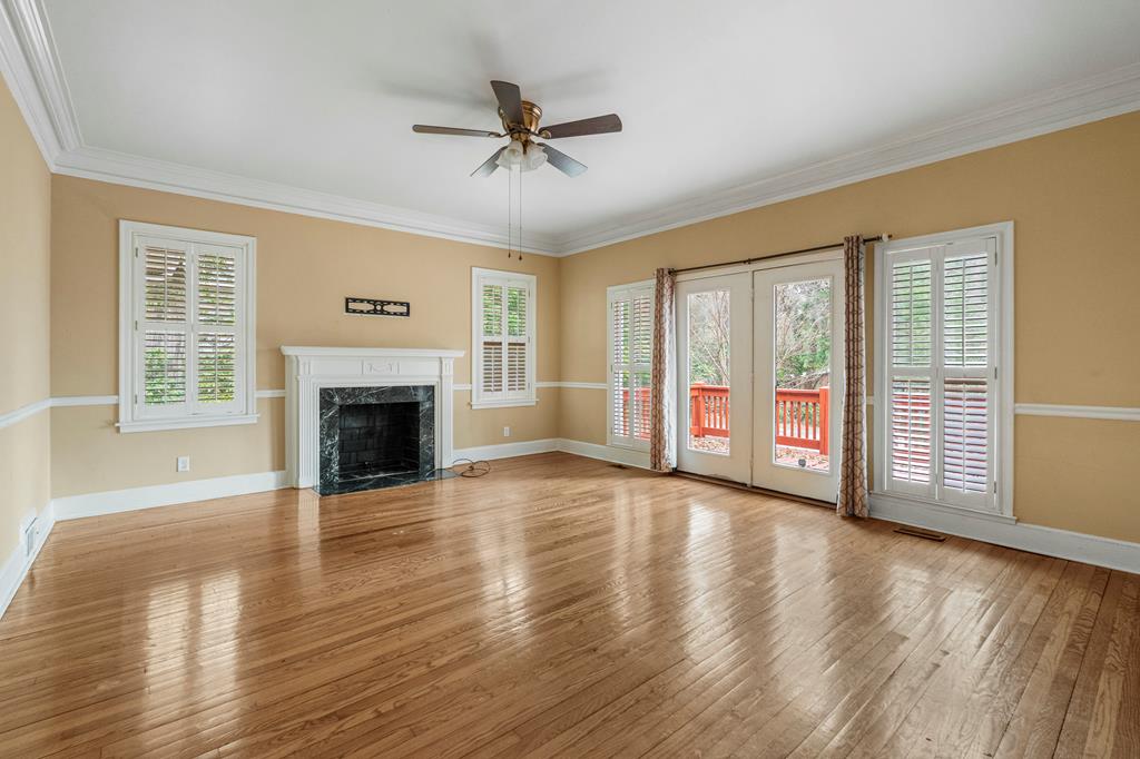 1500 Preston Drive Columbus, GA 31906 - Photo 4 of 29 a view of an empty room with a window and fireplace