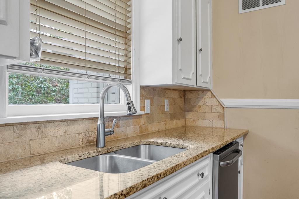 1500 Preston Drive Columbus, GA 31906 - Photo 7 of 29 a kitchen with a sink and cabinets