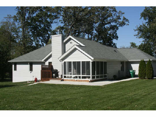 7353 Middle Road South Beloit, IL 61080 - Photo 3 of 11 a front view of house with yard and green space