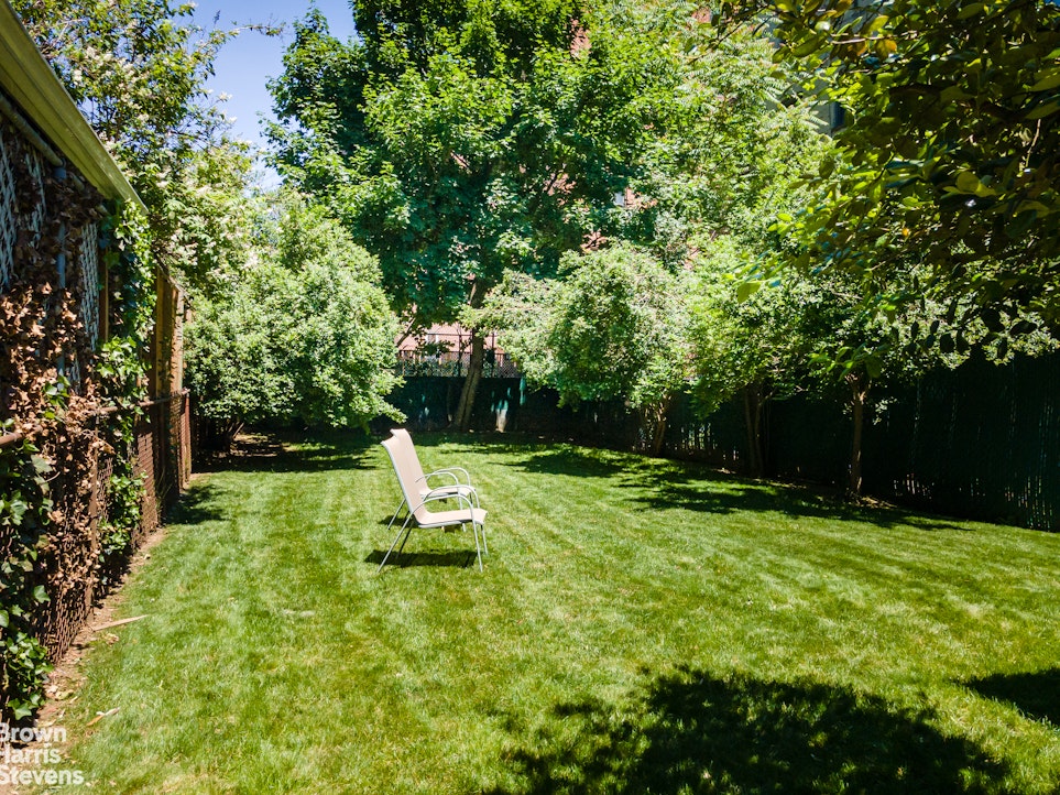 1917 Glenwood Road Brooklyn, NY 11230 - Photo 17 of 22 a view of a garden with a slide