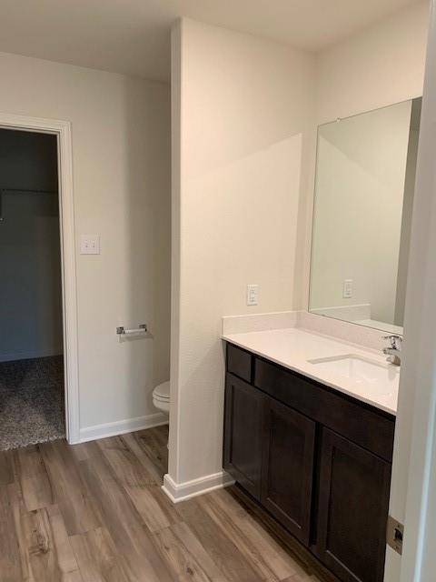 3023 Villegas Way Forney, TX 75126 - Photo 11 of 34 MASTER VANITY WTIH WHITE QUARTZ AND PRIVACY WALL TO COMMODE