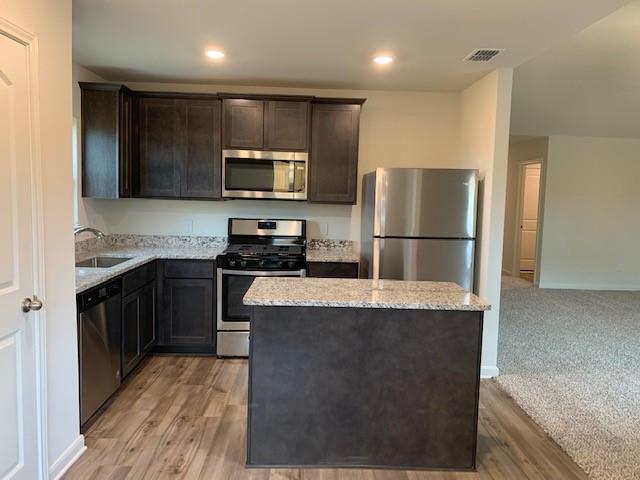 3023 Villegas Way Forney, TX 75126 - Photo 3 of 34 GREAT KITCHEN WITH GRANITE, ISLAND, AND REFRIGERATGOR