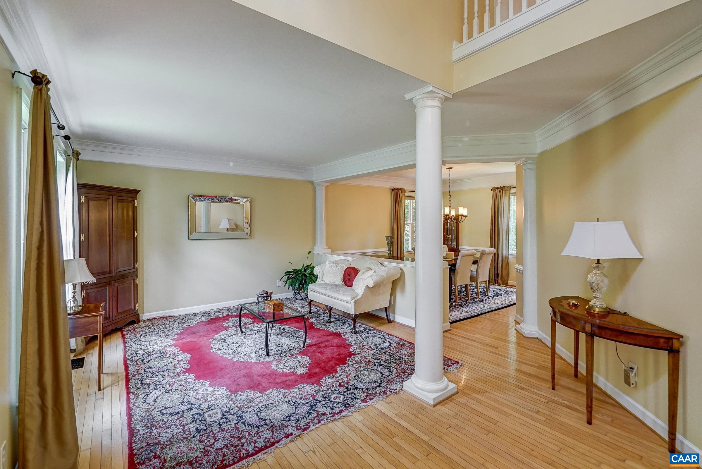 2050 Shepherds Ridge Road Charlottesville, VA 22901 - Photo 5 of 68 a living room with furniture and a wooden floor