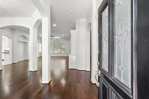 a view of entryway with wooden floor