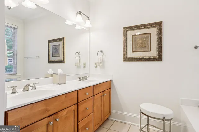 a white bath tub sitting next to a window