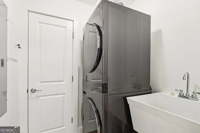 a bedroom with furniture and windows