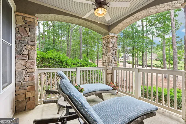 a balcony view with a garden and outdoor space