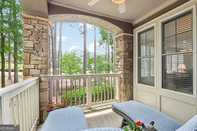 a view of a park with large trees