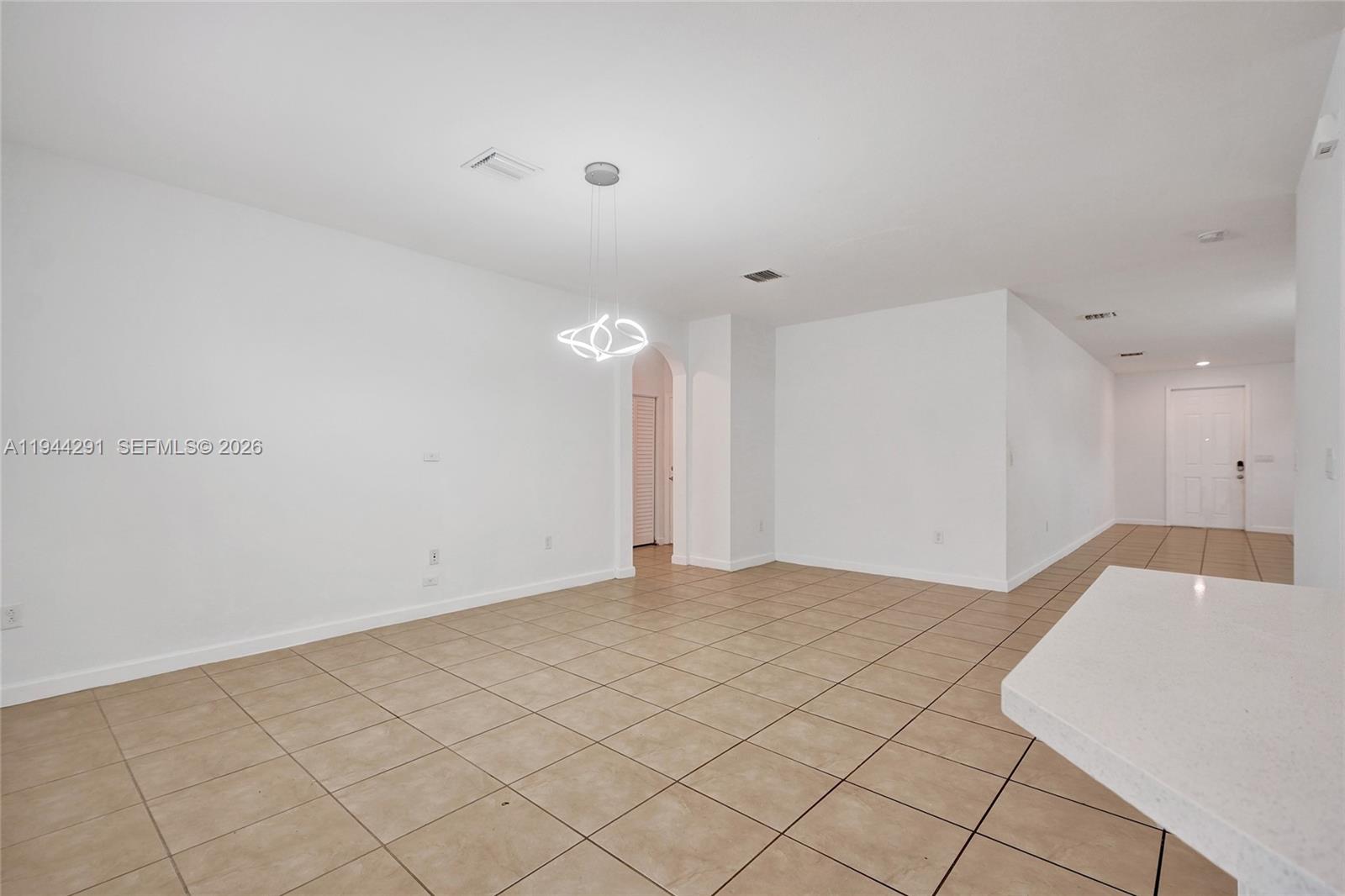 3504 West 94th Street Hialeah, FL 33018 - Photo 17 of 61 a view of an empty room and window