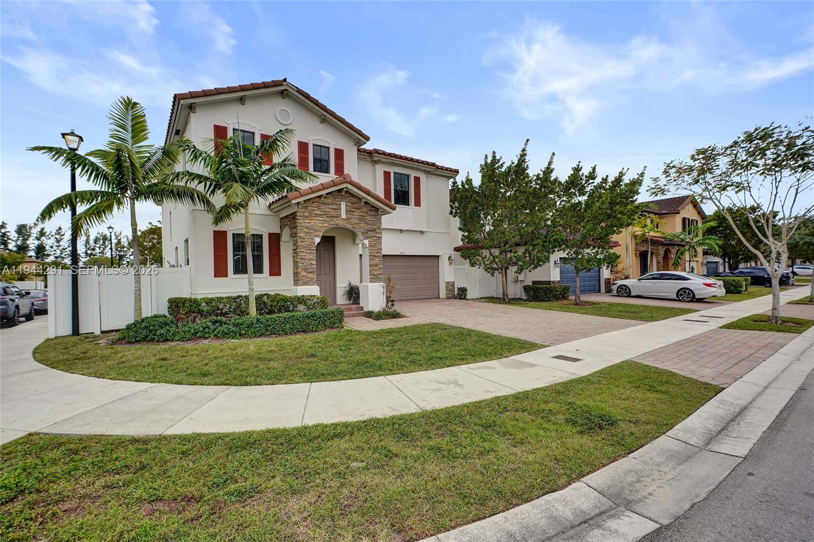 3504 West 94th Street Hialeah, FL 33018 - Photo 2 of 61 a front view of a house with a yard