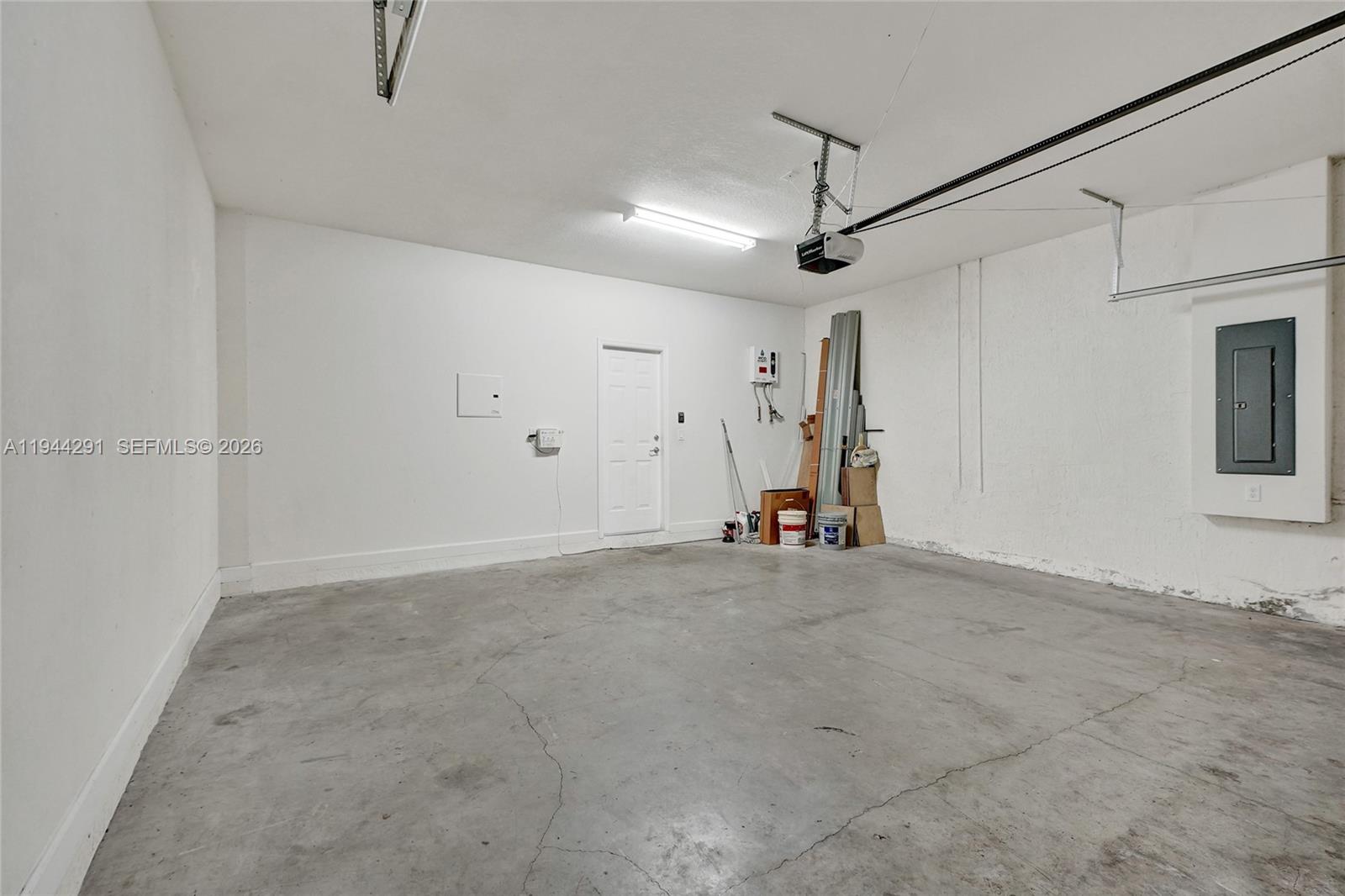 3504 West 94th Street Hialeah, FL 33018 - Photo 25 of 61 a view of a livingroom with a ceiling fan and window