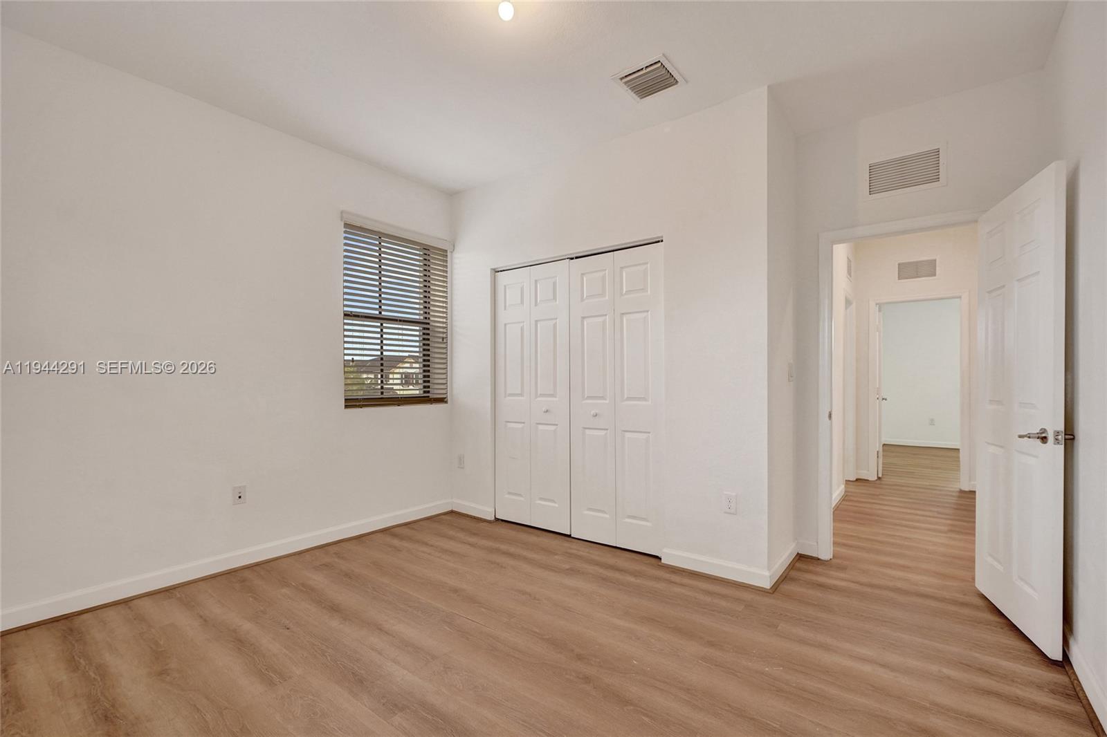 3504 West 94th Street Hialeah, FL 33018 - Photo 43 of 61 wooden floor in an empty room