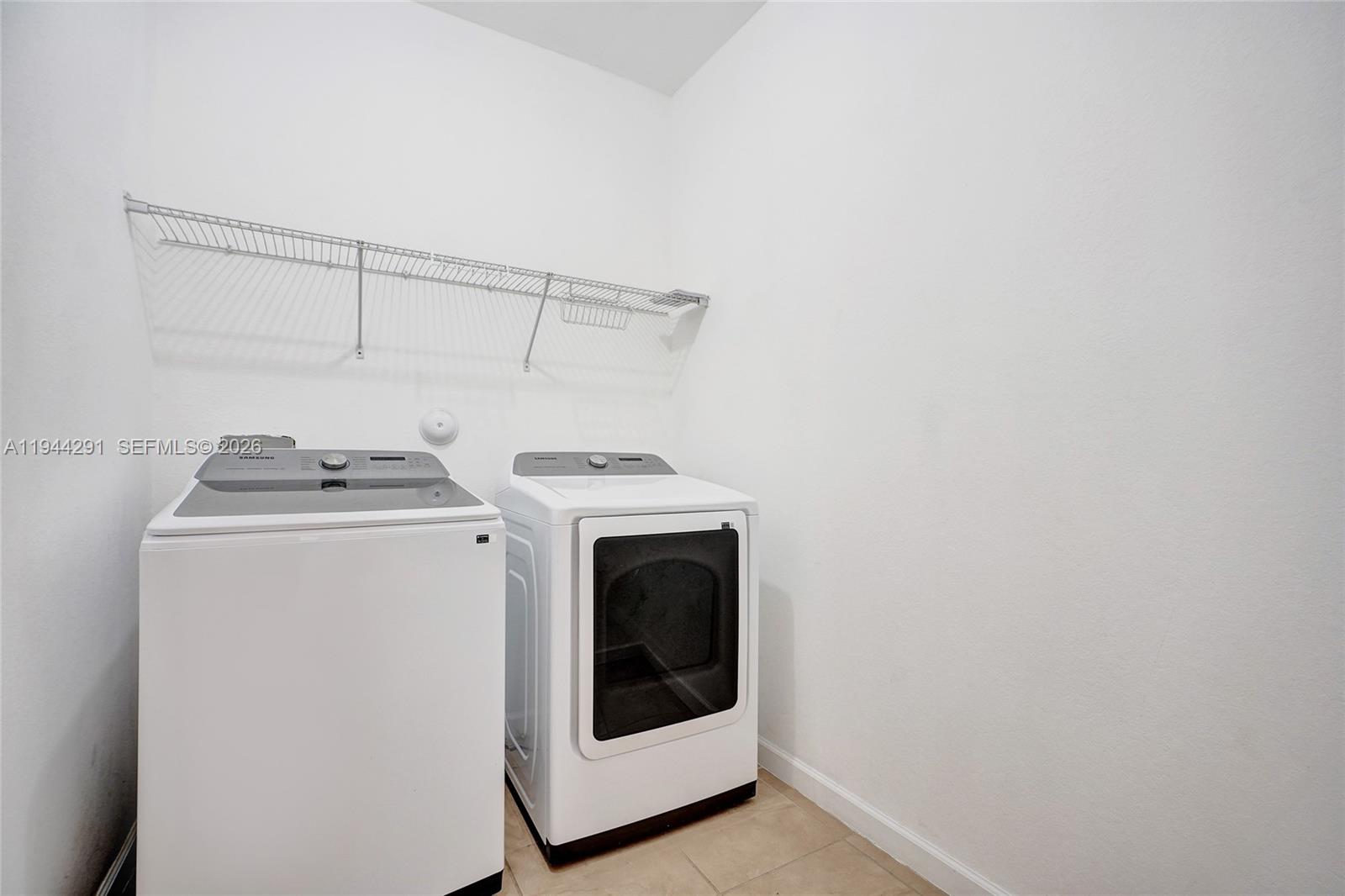 3504 West 94th Street Hialeah, FL 33018 - Photo 47 of 61 a utility room with dryer and washer