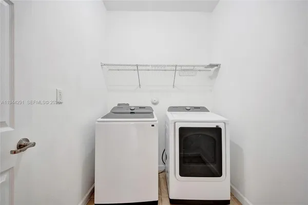 a view of a backyard of the house