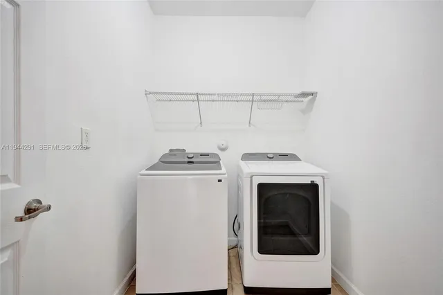 a view of a backyard of the house