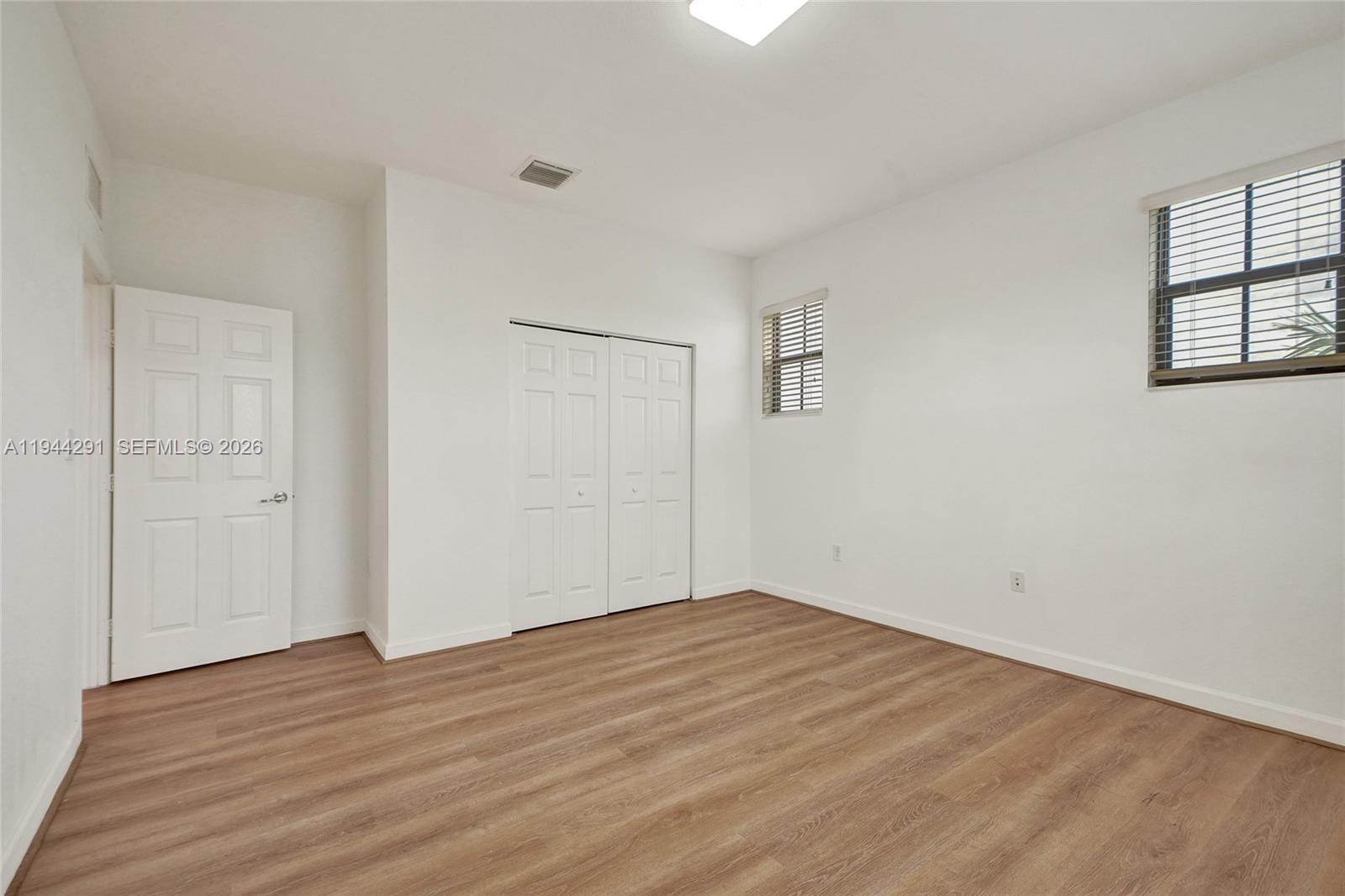3504 West 94th Street Hialeah, FL 33018 - Photo 50 of 61 wooden floor in an empty room