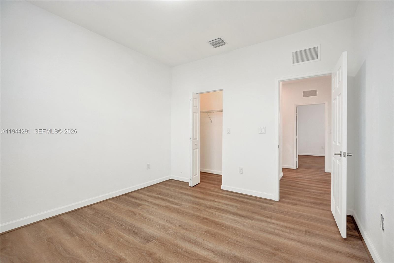 3504 West 94th Street Hialeah, FL 33018 - Photo 56 of 61 a view of a room with wooden floor