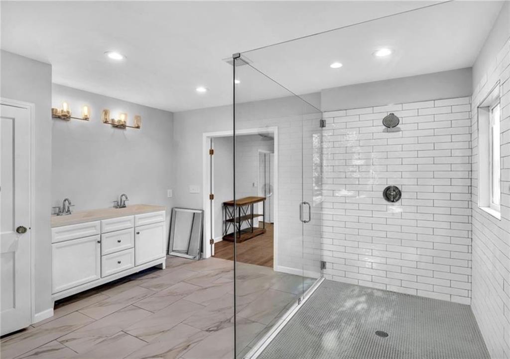 2222 Beecher Road Southwest Atlanta, GA 30311 - Photo 13 of 15 a bathroom with a shower and a sink