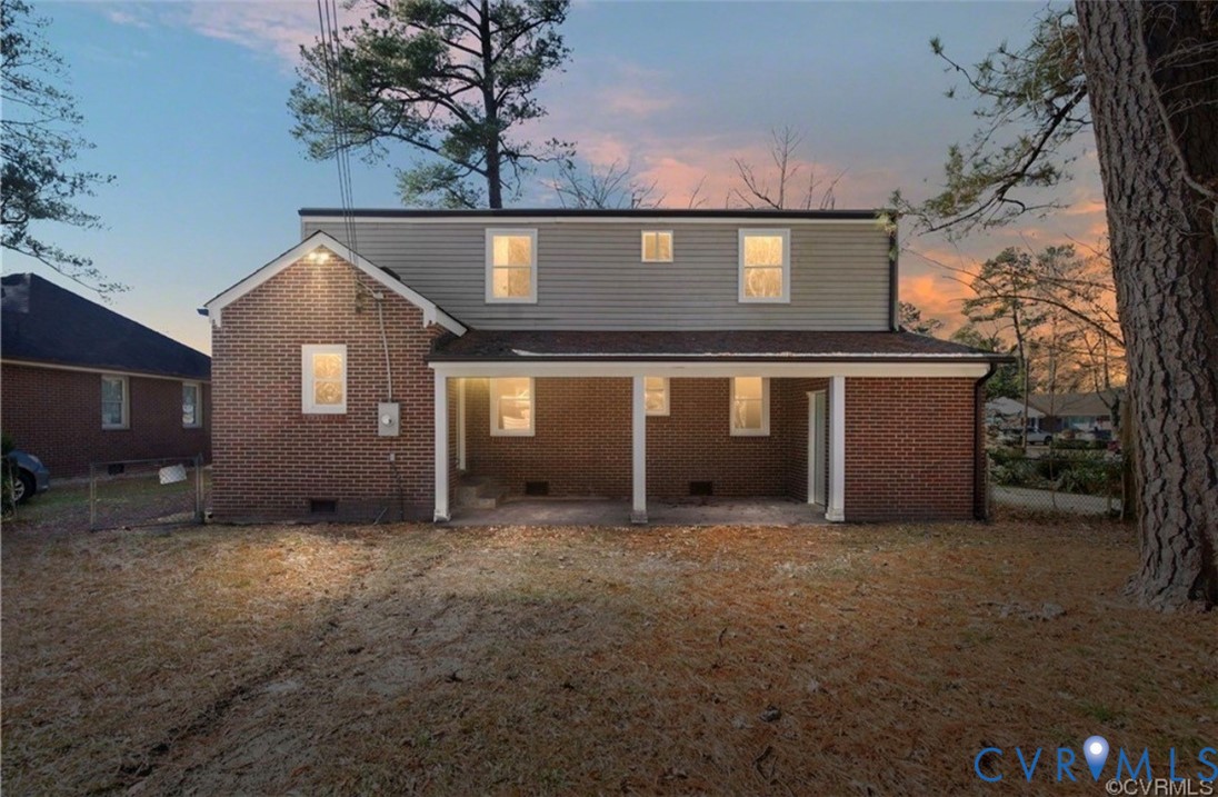 710 Hampton Road Petersburg, VA 23805 - Photo 22 of 24 Rear exterior featuring a brick and siding facade