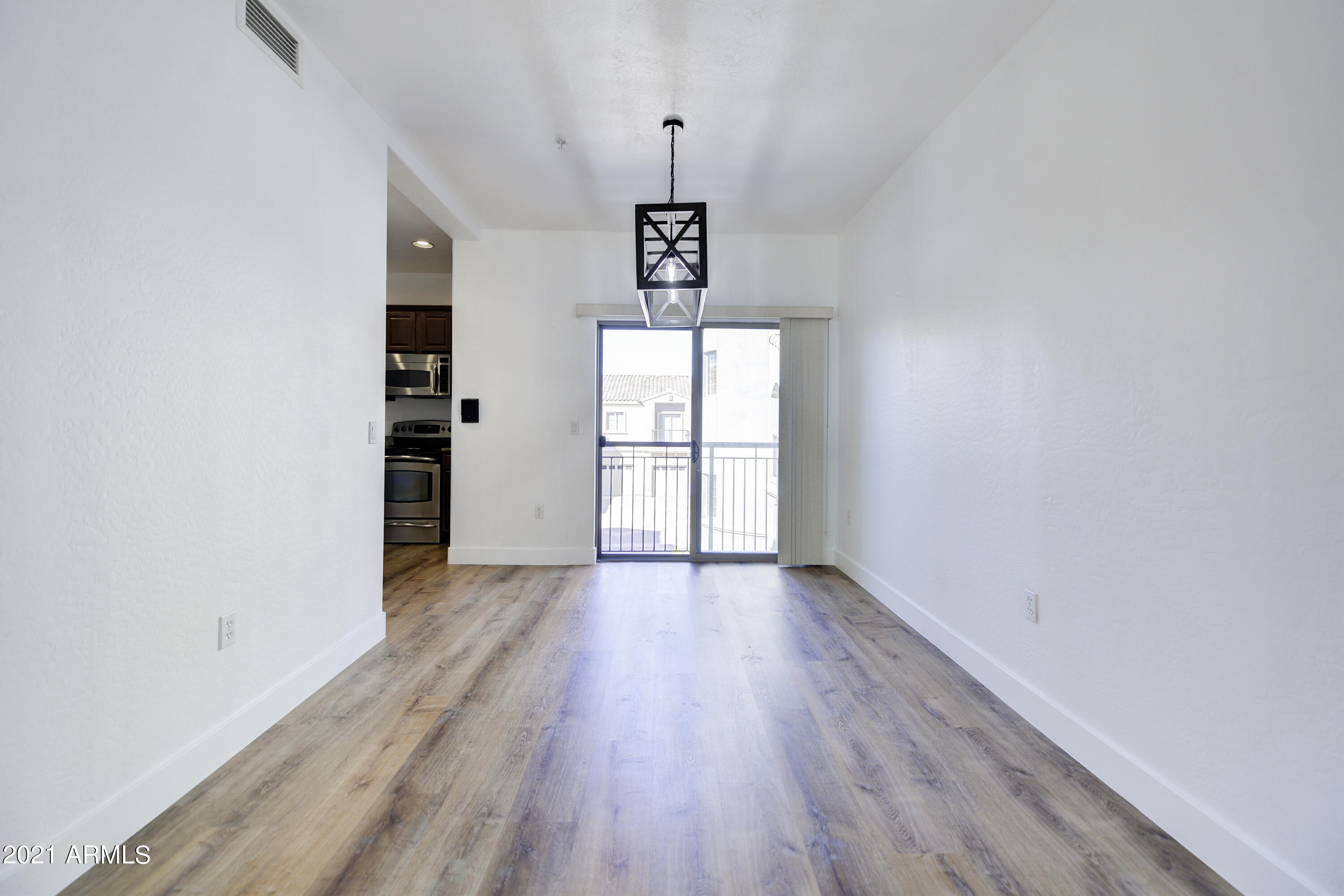 3935 East Rough Rider Road, Unit 1363 Phoenix, AZ 85050 - Photo 13 of 40 010_Dining
