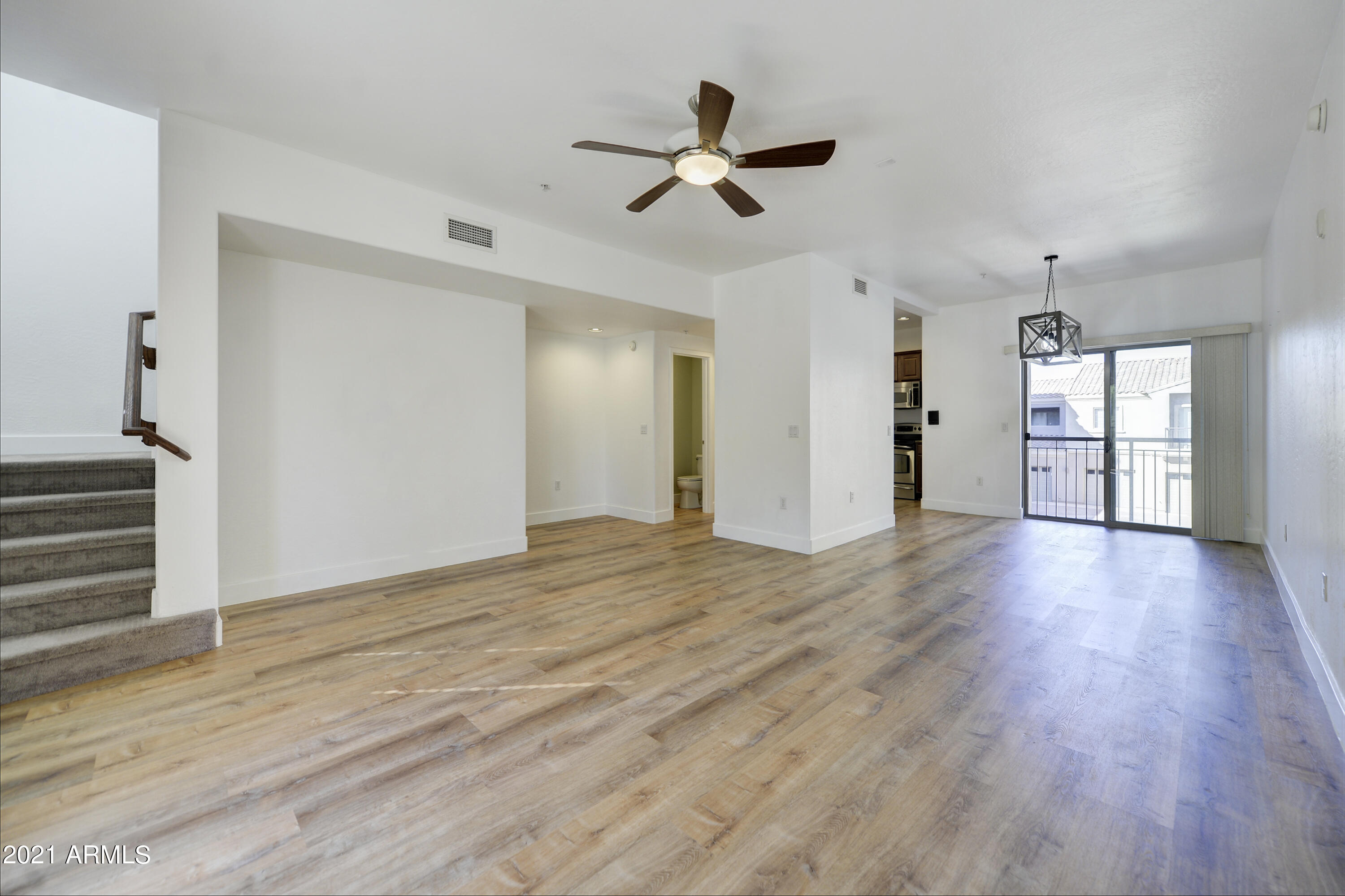 3935 East Rough Rider Road, Unit 1363 Phoenix, AZ 85050 - Photo 5 of 40 004_Great Room