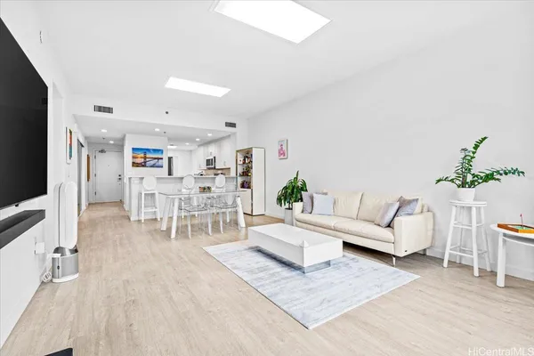 a living room with furniture and a table