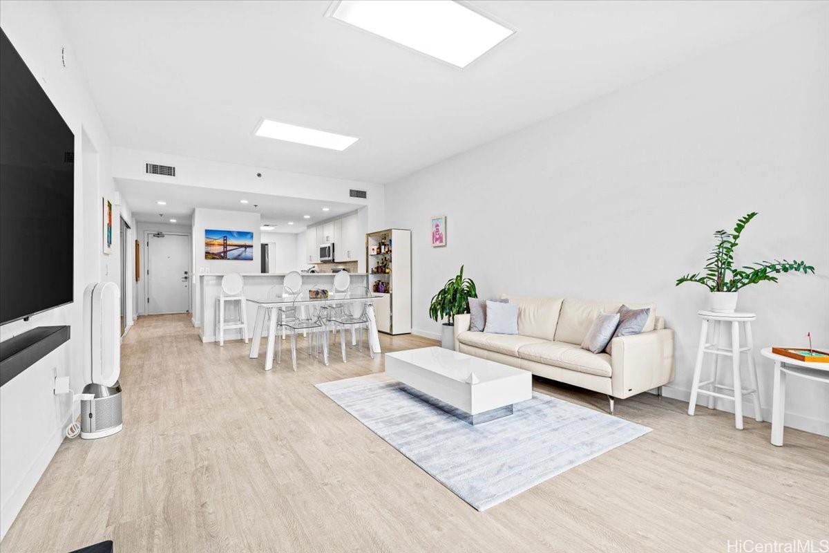 a living room with furniture and a table