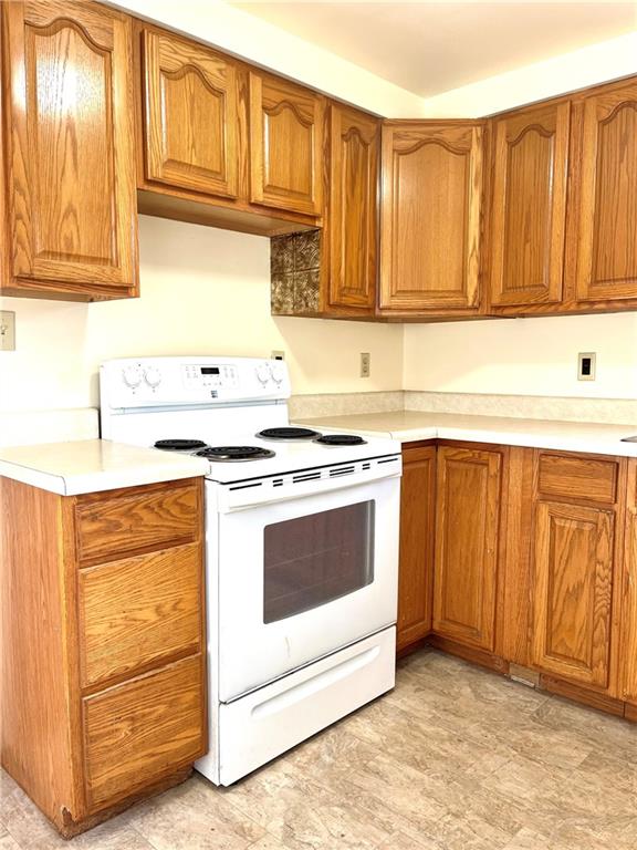 216 Bettis Road Dravosburg, PA 15034 - Photo 4 of 10 a kitchen with granite countertop cabinets stainless steel appliances and sink