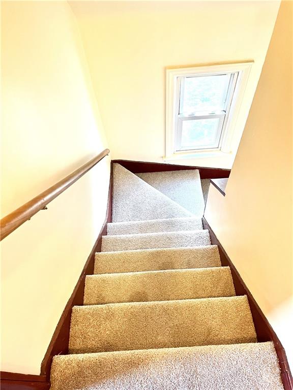 216 Bettis Road Dravosburg, PA 15034 - Photo 10 of 10 a view of staircase with black and white walls