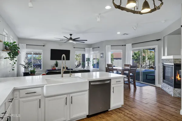 a shelf with books and knick knacks on it