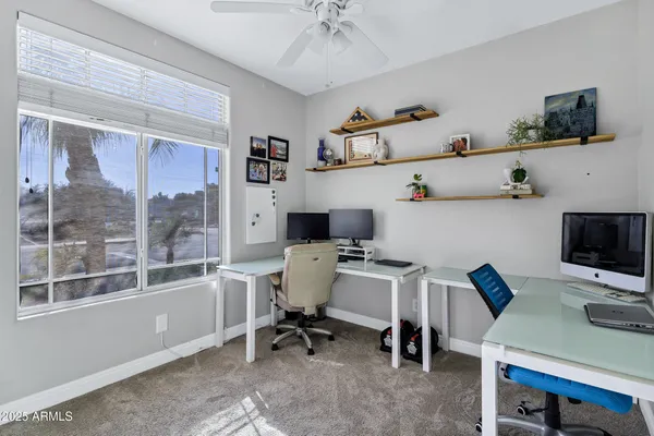 a bathroom with a bathtub sink and mirror